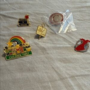 Group of educational pins.